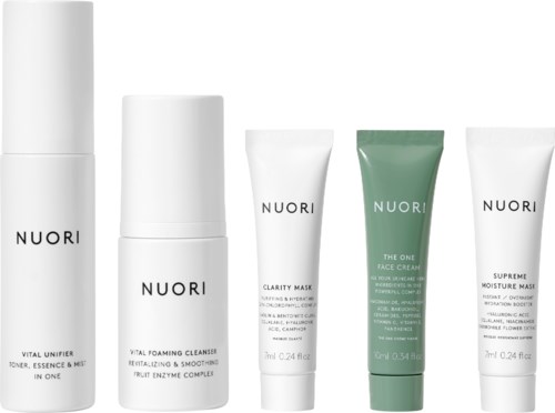 Five skincare products including cleansers, masks, and a face cream with simple, minimal packaging.