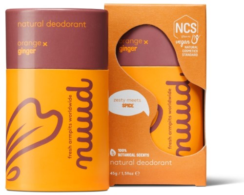 A deodorant container with orange and purple colors, labeled as natural, vegan, with orange and ginger scent.