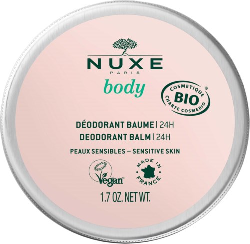 En rund behållare med Nuxe Body deodorant balm med veganska och ekologiska märkningar, lämplig för känslig hud.