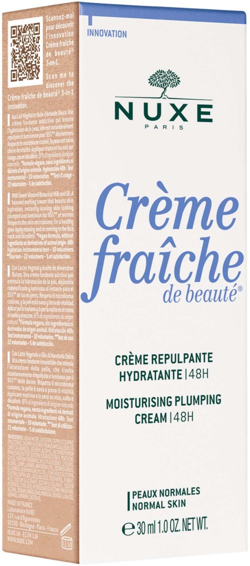 Een huidverzorgingsdoos met blauwe en groene tekst, beschrijft vochtinbrengende en hydraterende crème voor normale huid.