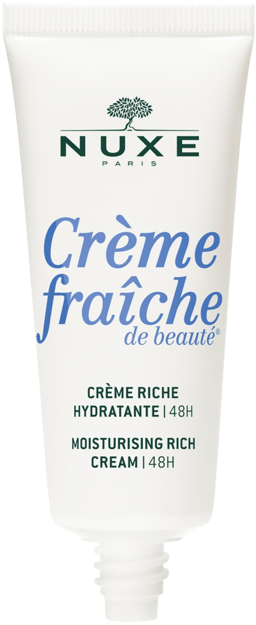Een witte tube van Nuxe hydraterende rijke crème met blauwe en groene tekst, die hydration en frisheid aangeeft.