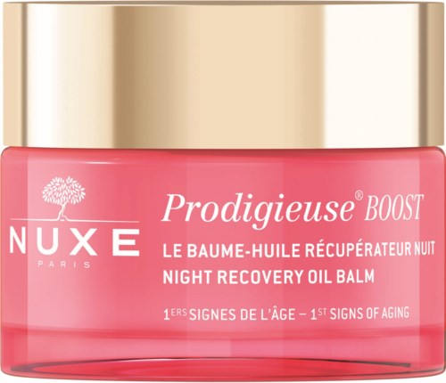 Roze potje van NUXE Prodigieuse Boost nachtherstellende olie-balsem met gouden deksel, veel Franse woorden en een boomlogo.