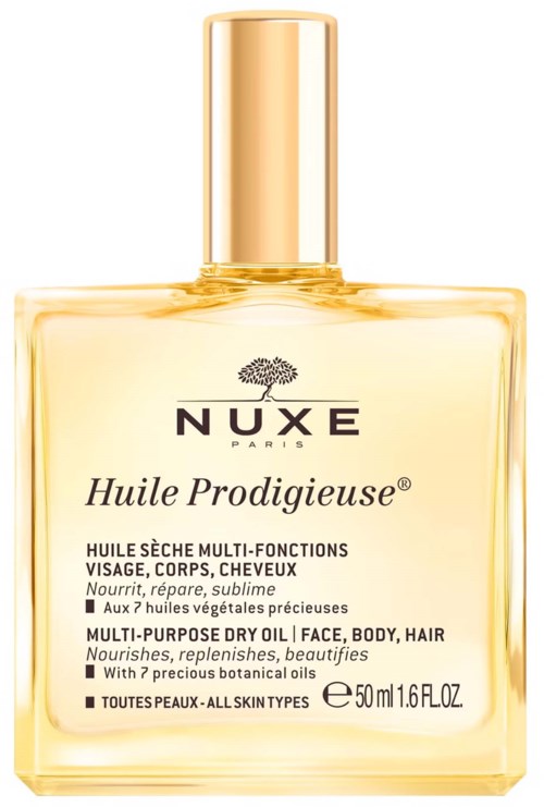 En gul flaska med en guldkork som innehåller Nuxe Huile Prodigieuse, en mångsidig olja för ansikte, kropp och hår.