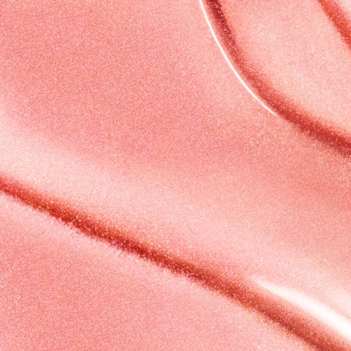 En slät, rosa, skimrande yta med mjuka kurvor och mjuka ljusreflexer.