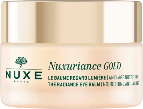 En liten krukke med Nuxe Nuxuriance Gold øyebalm med gullfarget lokk og grønn tekst på lys bakgrunn.