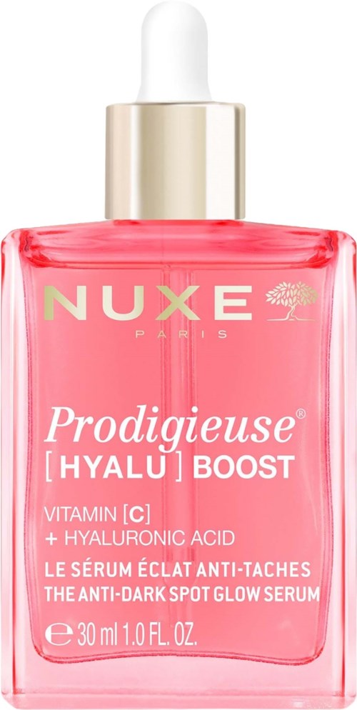 En lyserød hudpleje serum flaske med guld og hvid top, mærket Prodigieuse Hyalu Boost med vitaminer og hyaluronsyre.