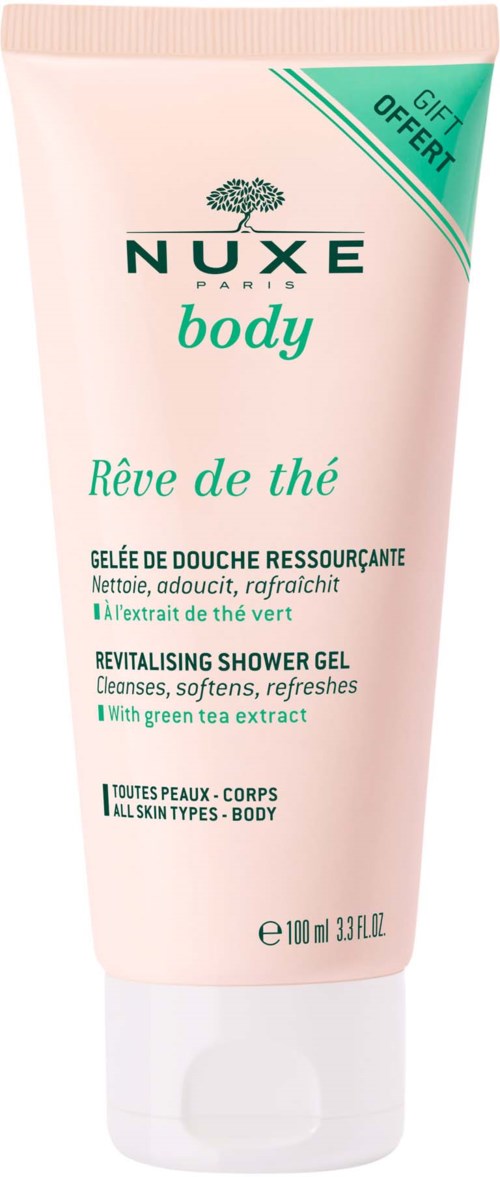 Een zachtroze tube Nuxe lichaamsdouchegel met groene thee-extract, geschikt voor alle huidtypes, 100 ml.