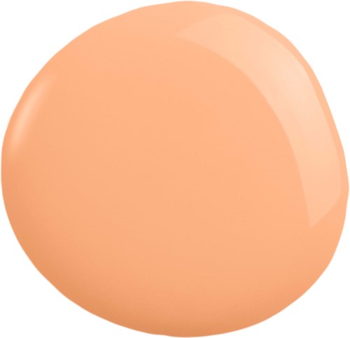 A soft, orange yolk for a fried egg, shiny and round with a slight shine.