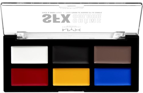Six colorful eyeshadow pans in a black case with a clear lid, each in a different color: white, black, brown, red, yellow, blue.