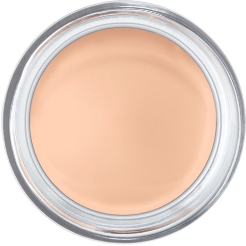 En rund behållare med beige ansiktspuder inuti, sedd uppifrån.
