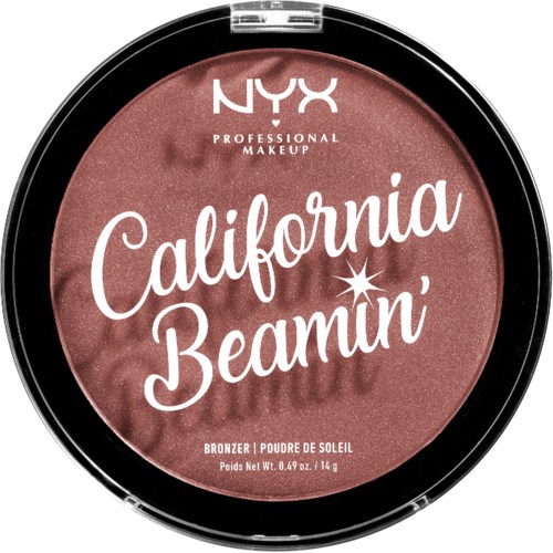 A round makeup product labeled 'California Beamin' by NYX, in a bronze shade with a pinkish tone.