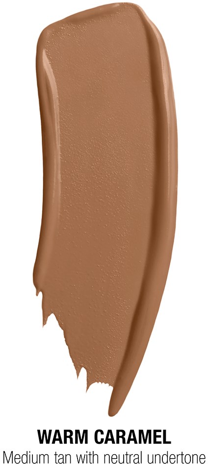 En drag av varm karamellfärgad foundation eller makeupprodukt på en vit bakgrund.