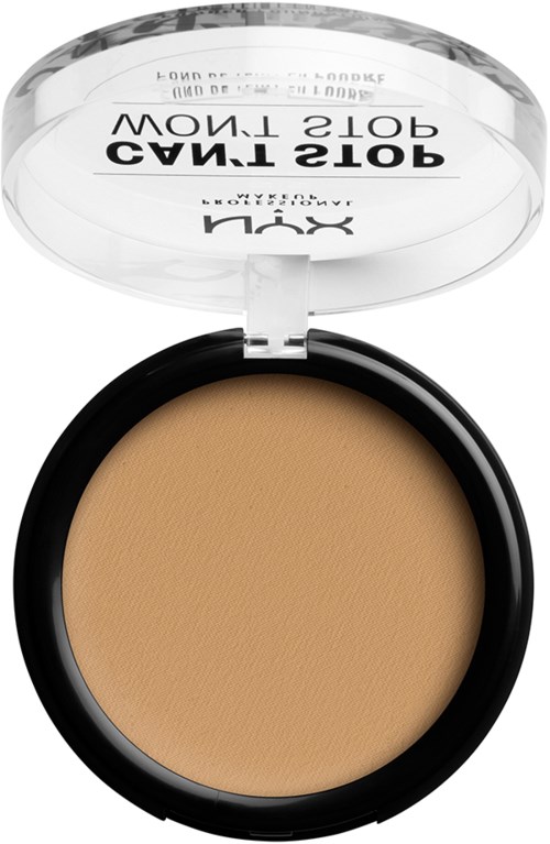 En rund behållare med beige makeup inuti och ett transparent lock med svart text.