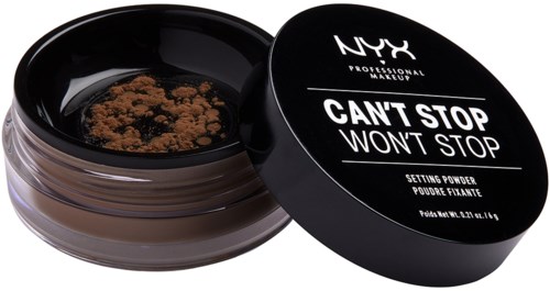 Løst setting-pulver i en rund beholder med sort låg, der står NYX, 'Can't Stop Won't Stop.'