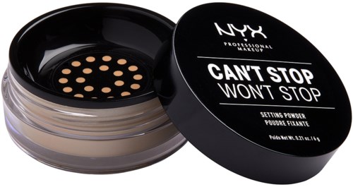 En rund beholder med NYX setting powder og sort låg. Låget viser teksten "Can't Stop Won't Stop."