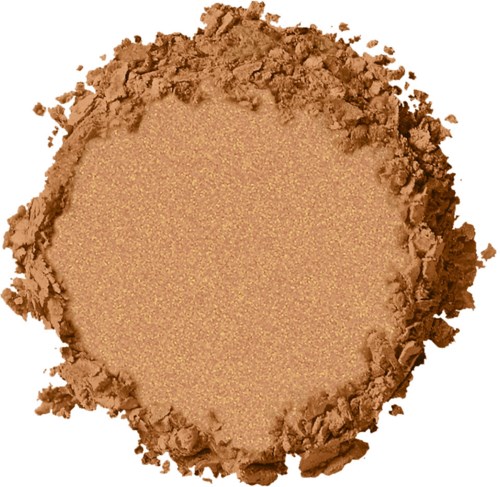 En rund, beige pulver med ojämna, grova kanter och en slät mitt.