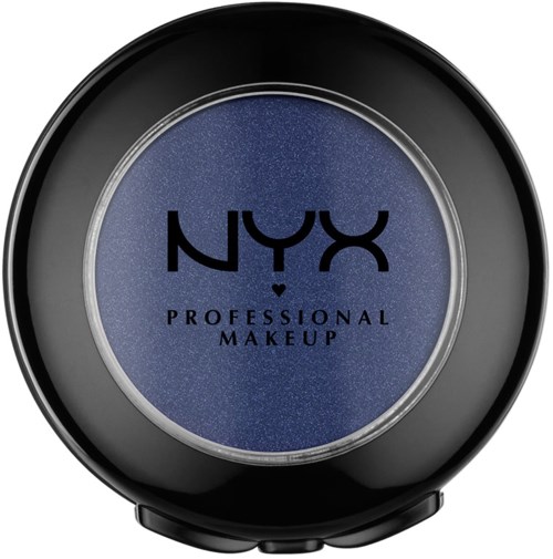 Ett runt makeup-emballage med mörkblå lock och NYX-loggan på.