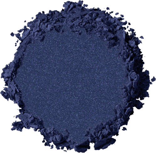 En rund mörkblå krossad pigment med små glittrande partiklar i mitten.