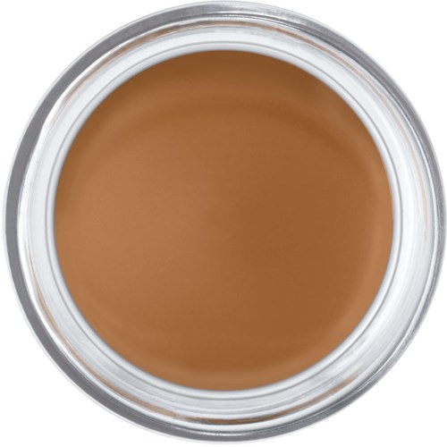 Brunt makeupprodukter i en rund behållare, sett ovanifrån.