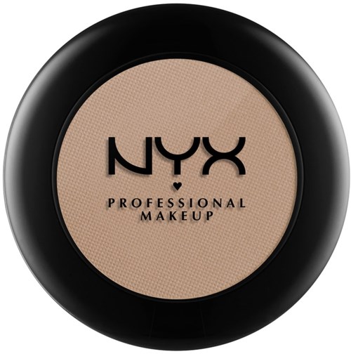 En kompakt, rund makeup-behållare med beige puder och svart lock, visar NYX-loggan och 'Professional Makeup'.