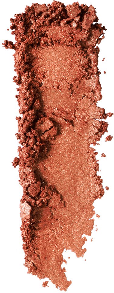 En makeupprodukt, troligen ett krossat eller löst puder i en rödbrun nyans.