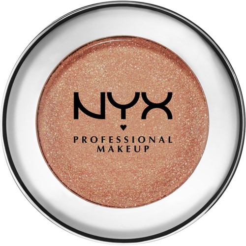 A round container of glittery peach-colored NYX Professional Makeup blush or highlighter.