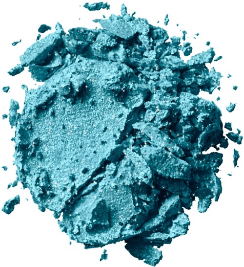Blue powdered drug, crushed into small pieces, with some larger chunks around it.