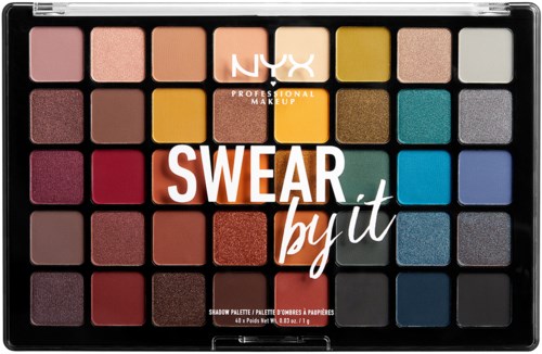 A NYX eyeshadow palette with many colorful shades, arranged in rows and a label saying "SWEAR by it."