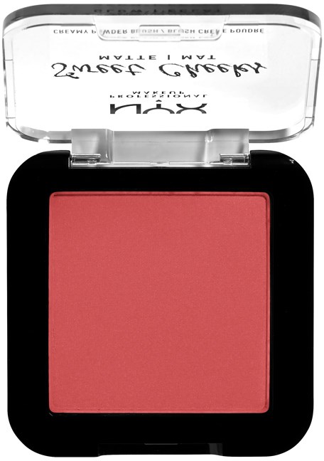 A pink blush inside a black compact with a clear plastic lid featuring black text.