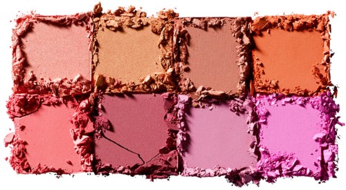 Seks sminkrouge plassert i to rader, med knuste kanter. Farger inkluderer rosa, fersken, brunt, oransje, rødt og lilla.