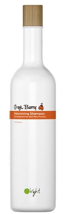 En lång vit flaska med ett trähatt, märkt 'Gorgeous Berry' volymgivande schampo, och en liten grön och svart logga.