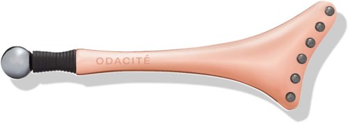 Handgerät mit runder Spitze und mehreren schwarzen Knöpfen, beschriftet 'ODACITÉ', auf einem hellrosa Körper.