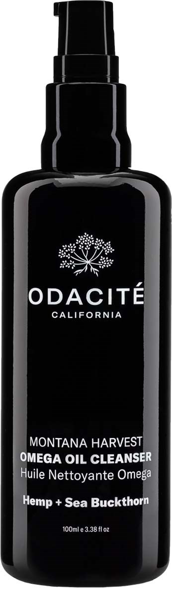 A black bottle with a pump, labeled Odacité Montana Harvest Omega Oil Cleanser with hemp and sea buckthorn.