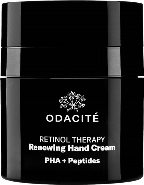 En svart burk med ODACITÉ Retinol Therapy handkräm med PHA och peptider för hudens förnyelse.