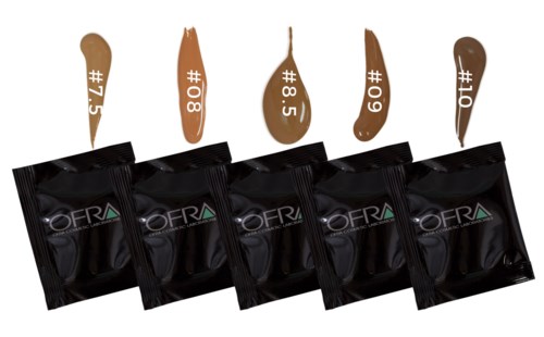 Fem svarta paket med olika foundationfärger och motsvarande färgprover.