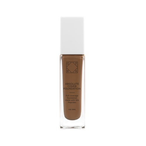 En flaska foundation med vit kork, märkt "Absolute Cover" och erbjuder full täckning av makeup.