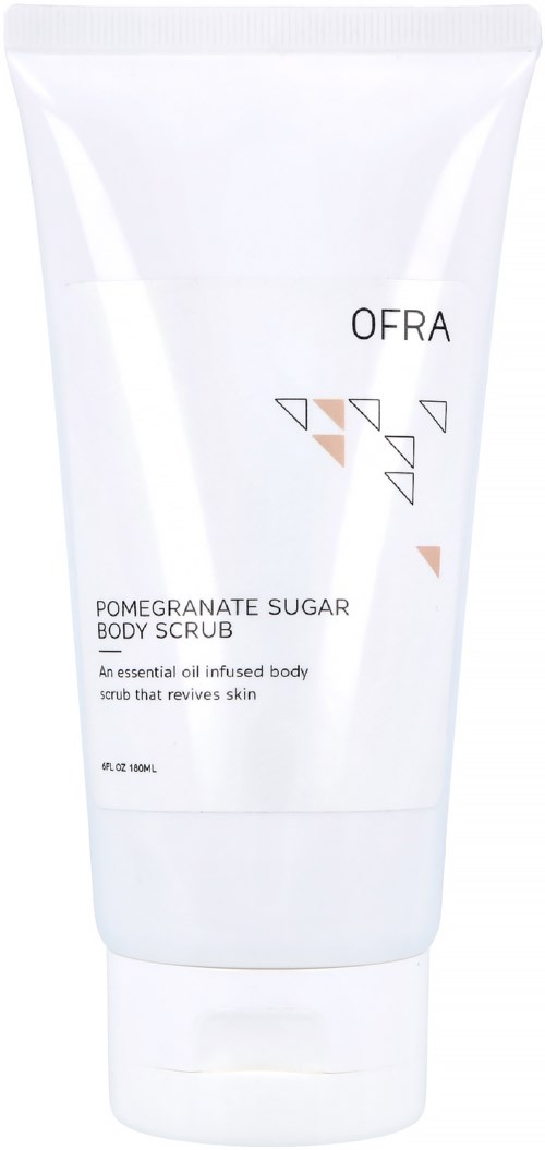 En vit tub märkt 'OFRA Pomegranate Sugar Body Scrub' med enkel, modern design och liten text.