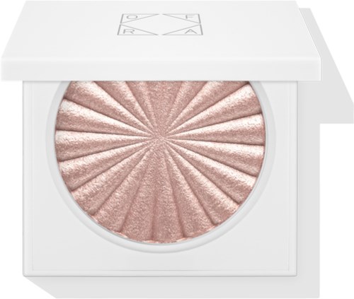 Ein weißer Make-up-Deckel mit einem schimmernden rosa Highlighter im Sternburst-Design.