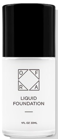 En flaske merket 'Liquid Foundation' med en geometrisk logo, svart lokk og gjennomsiktig beholder som viser produktet inni.
