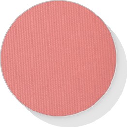 A round, pink makeup blush with a textured surface in a circular container.