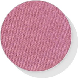 A round pink makeup blush with a textured surface and a subtle shimmer.