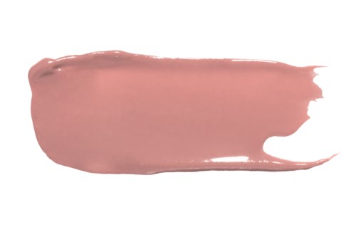 Een beige of roze romige substantie is uitgesmeerd op een witte achtergrond.