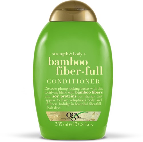 Grön flaska med bamboo fiber-full balsam, guldlock, text beskriver dess fördelar för hår och kropp.