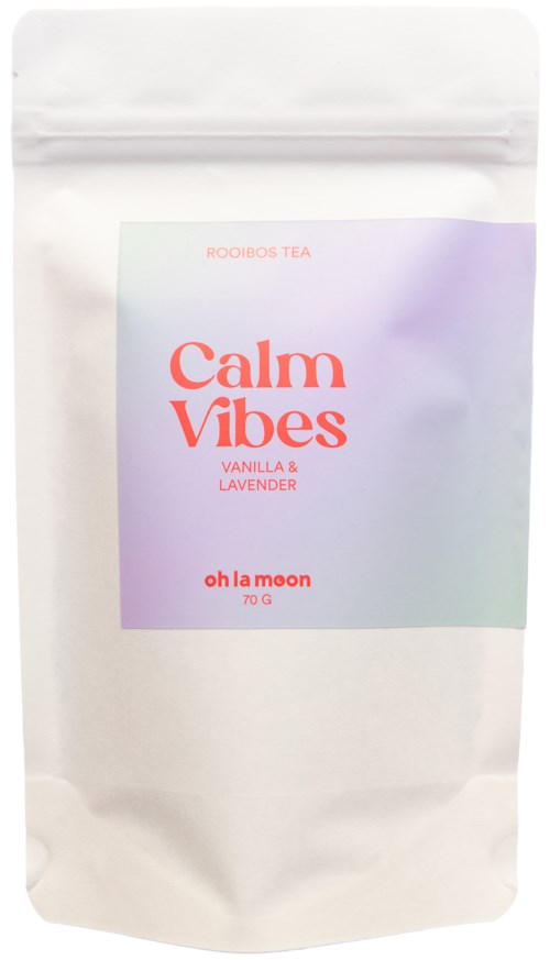 A white tea package labeled 'Calm Vibes' with vanilla and lavender, in soft pastel colors.