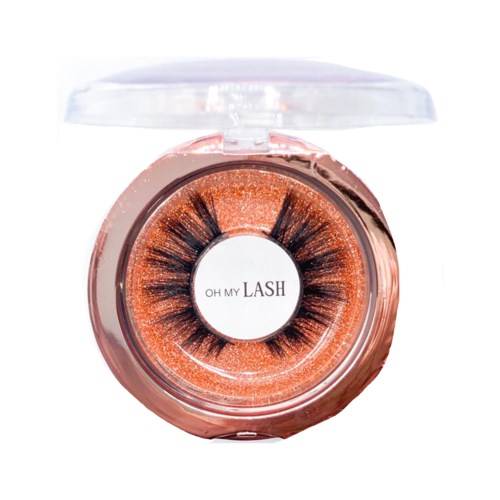 Falske øjenvipper i en rund beholder med glitrende orange glitter og gennemsigtigt låg.