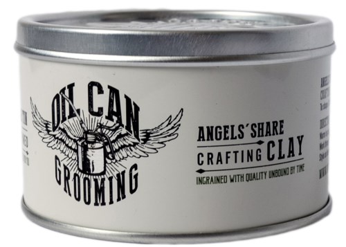 A round metal container with a label saying 'On Can Grooming' and 'Crafting Clay' for grooming products.