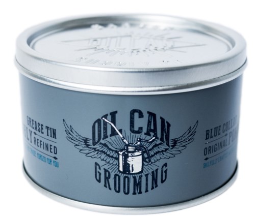 En rund, blå metallboks med merket 'On Can Grooming' og en logo av en stellebørste med vinger.