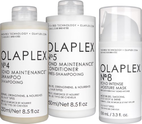 Tre hårvårdsprodukter märkta som Olaplex: No. 4 schampo, No. 5 balsam och No. 8 mask, i vita flaskor.