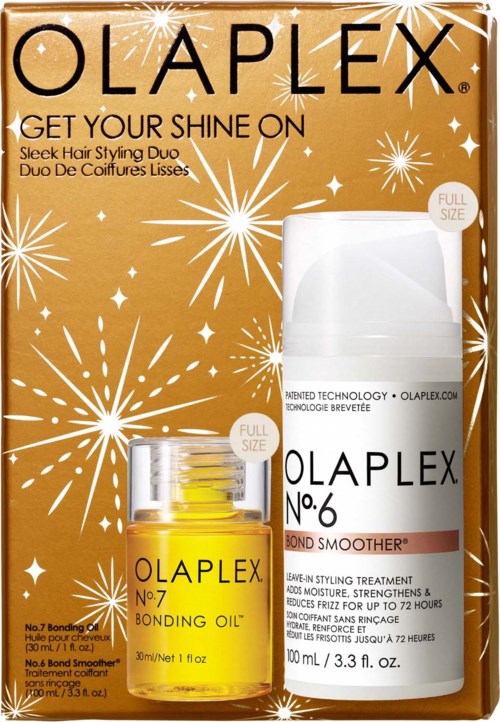 Een doos met Olaplex haarproducten, inclusief Bond Smoother en Bonding Oil, met een sterretjesachtergrond.