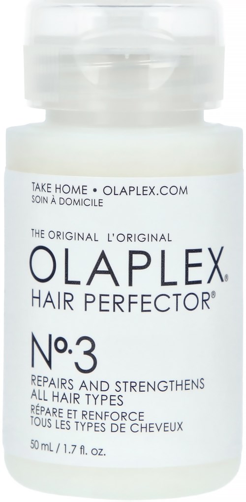 En hvid flaske mærket Olaplex No.3, bruges til at reparere og styrke alle hårtyper.